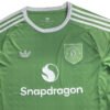 Manchester United 25/26 Third Jersey Manchester United third soccer jersey with Snapdragon logo, green color, and iconic club crest.