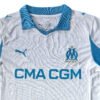 Lisbon Traning Soccer Jersey for 25/26 Season White and blue Lisbon training soccer jersey with OM logo and sponsor details.