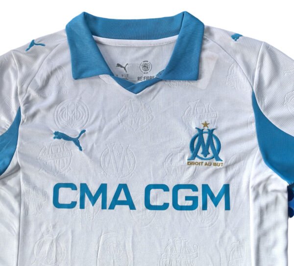 Lisbon Traning Soccer Jersey for 25/26 Season White and blue Lisbon training soccer jersey with OM logo and sponsor details.