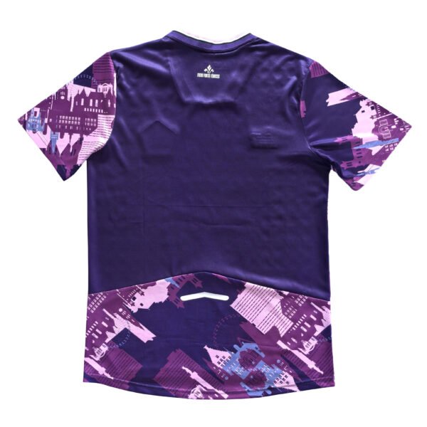 Pisa 25/26 home soccer jersey with purple and pink cityscape design, perfect for fans and players.