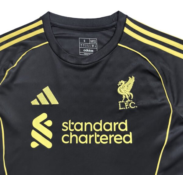 Liverpool FC 25/26 Home Soccer Jersey Liverpool 25/26 home soccer jersey with LFC crest and Adidas logo.