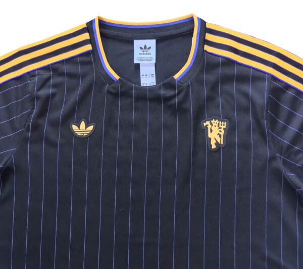 Manchester United Third Soccer Jersey 25/26 Manchester United third kit jersey for 2025/26 season, featuring black color with yellow accents and.