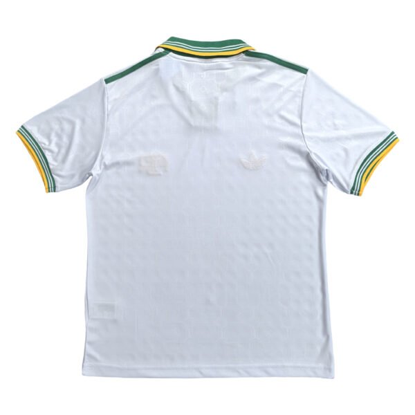 Lisbon Traning Soccer Jersey White Lisbon training soccer jersey with green and yellow accents.