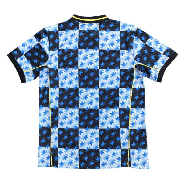 Alternate Manchester United 2025/26 third kit with vibrant blue and black geometric pattern.