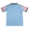 Miami Polo Shirt - 25/26 Bright blue Miami polo shirt with pink and black accents, perfect for sports and casual wear.