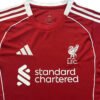 Red Liverpool 25/26 home soccer jersey with white logo and details.