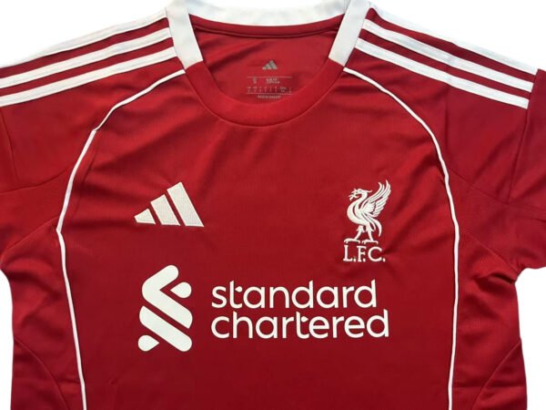 Red Liverpool 25/26 home soccer jersey with white logo and details.