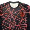 Lisbon Traning Soccer Jersey Training soccer jersey with Atlético Madrid design, black with pink abstract lines.