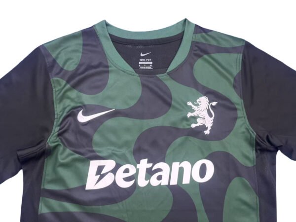 Pisa 25/26 home soccer jersey with green and navy camouflage design, featuring the Betano sponsor an.