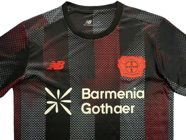 Pisa 25/26 Home Soccer Jersey Pisa 25/26 home soccer jersey with black and red design, featuring Barmenia and Leverkusen logos. Pe.