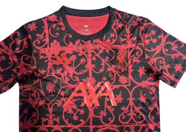 Pisa 25/26 home soccer jersey with intricate red and black design, featuring club logo and Adidas br.