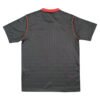 Manchester United 2025/26 third soccer jersey in black with red accents.