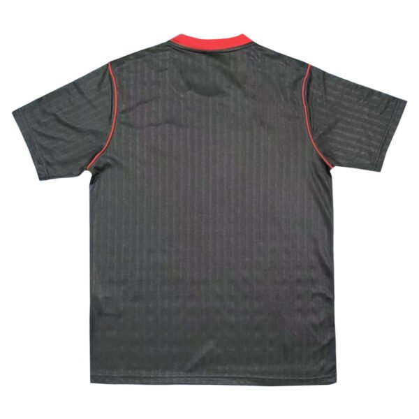 Manchester United 2025/26 third soccer jersey in black with red accents.