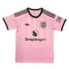 Pink Manchester United third soccer jersey with black accents and sponsor logo.