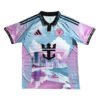 Stylish Lisbon training jersey with cityscape design and team logos.