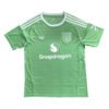Manchester United third kit 2025/26, green soccer jersey with Adidas and Snapdragon logos.