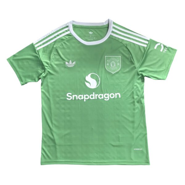 Manchester United third kit 2025/26, green soccer jersey with Adidas and Snapdragon logos.