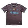 Manchester United 2025/26 third soccer jersey with team logos and design.