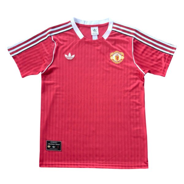 Manchester United third soccer jersey 2025/26 season, red with white accents.