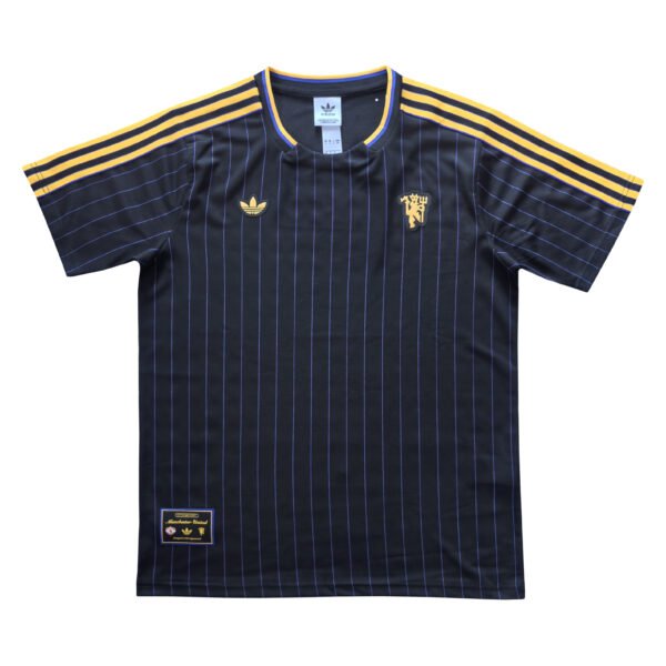 Manchester United third soccer jersey for 2025/26 season, navy with gold accents.