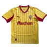 Pisa FC 25/26 home jersey with yellow base and red pinstripes, featuring Puma logo and Auchan sponso.