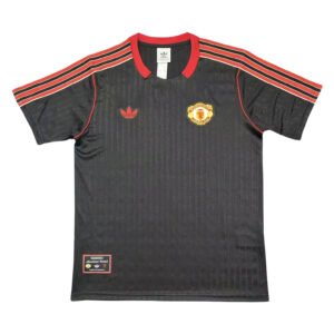 Manchester United third soccer jersey 2025/26, black with red accents, official team kit.
