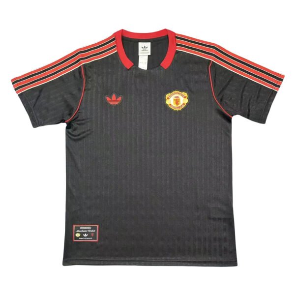 Manchester United third soccer jersey 2025/26, black with red accents, official team kit.