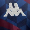 Sportswear embroidered logo patch on fabric background Embroidered logo patch featuring two stylized figures on sportswear fabric, ideal for athletic appar.