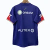Blue sports jersey featuring New Zealand map and sponsor logos, ideal for athletic wear.