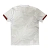 White sports jersey with stylish red and black striped sleeves for athletic wear.