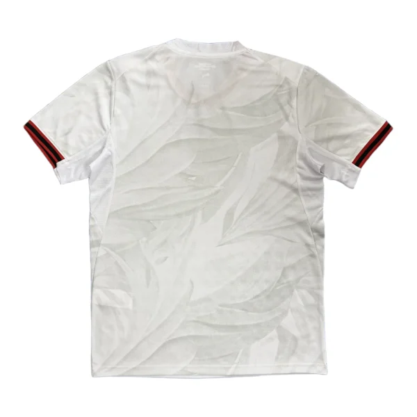 White sports jersey with stylish red and black striped sleeves for athletic wear.