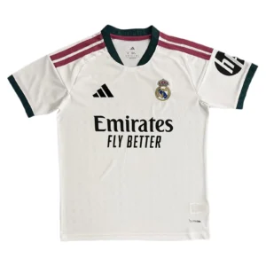 Real Madrid Soccer Jersey - White with Red and Black Accents Official Real Madrid football jersey featuring club crest and Emirates sponsor logo. Perfect for soc.
