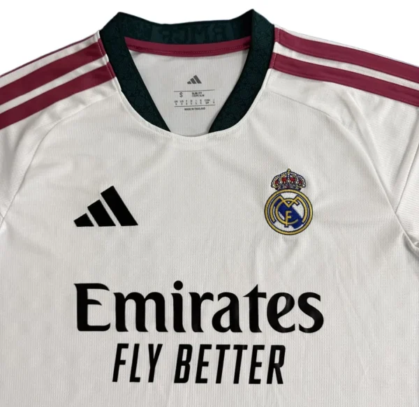 Real Madrid Soccer Jersey with Emirates Sponsorship and Adidas Logo Official Real Madrid football jersey featuring Emirates Fly Better branding and Adidas logo for spor.