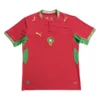Morocco national football team jersey with green and red design, Puma logo, and team emblem.