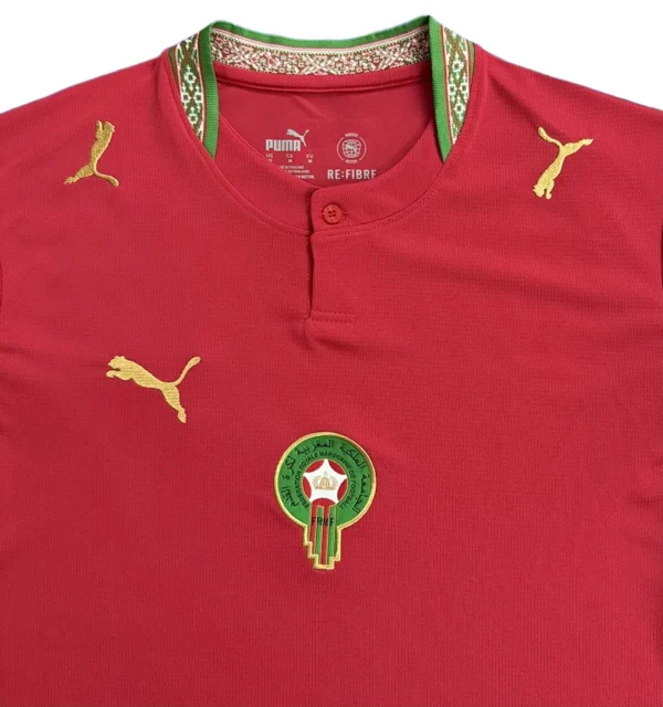 Morocco national football team jersey with Puma logo and emblem, red color, perfect for sports fans.