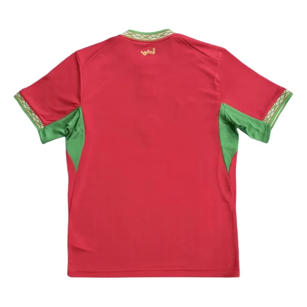 Sports jersey with green accents and gold embroidery, ideal for athletic activities and team sports.