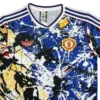 Colorful abstract sports jersey with Manchester United logo and Adidas stripes.