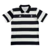 Juventus Black and White Striped Soccer Jersey Juventus black and white striped soccer jersey with Adidas logo and club crest.
