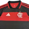 Football jersey with Flamengo logo and Adidas branding, black and red design. Flamengo football jersey with Adidas logo and team crest, ideal for sports fans.