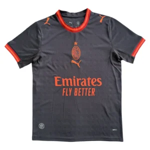 Milan Football Club Black and Orange Jersey Milan football jersey in black with orange accents, featuring club logo and Puma branding.