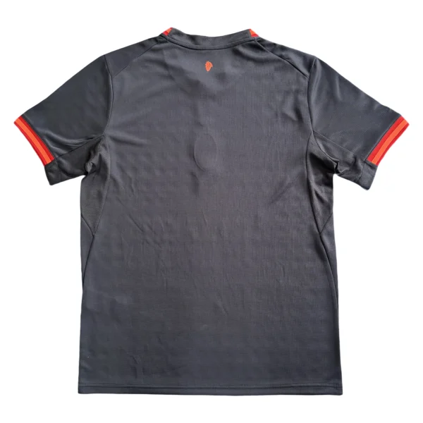 Sports Jersey for Men and Women - Black with Red Accents Black sports jersey with red accents on sleeves, designed for athletic performance and comfort.