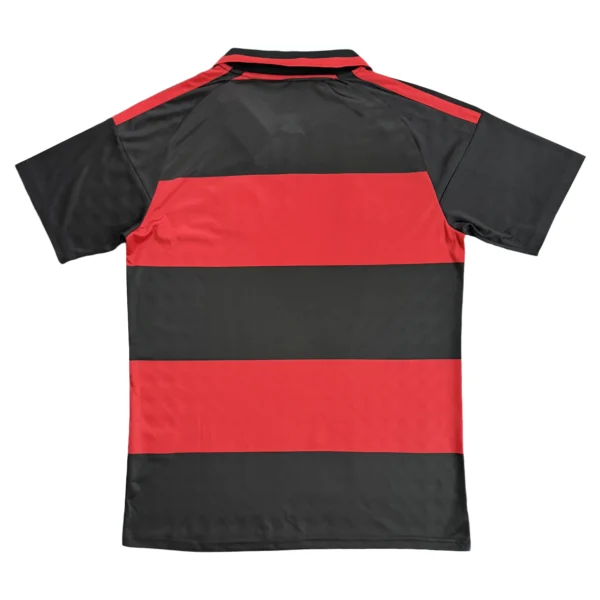 Sports Jersey with Red and Black Stripes Athletic sports jersey featuring bold red and black horizontal stripes, ideal for team sports and ac.