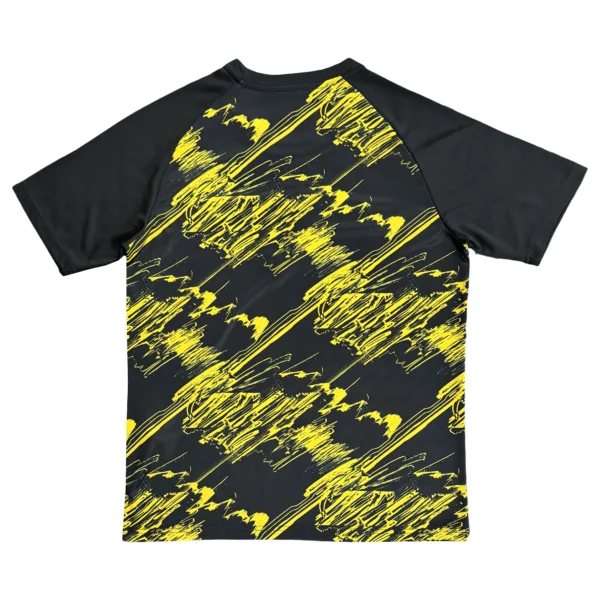 Black and yellow graphic sports T-shirt with dynamic design for activewear.