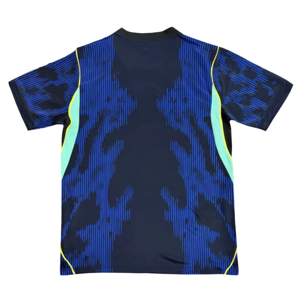 Sports Jersey with Blue and Neon Accents Athletic sports jersey featuring blue camouflage pattern with neon yellow accents.