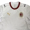 Milan football jersey with Puma logo and club crest, sportswear for soccer fans.