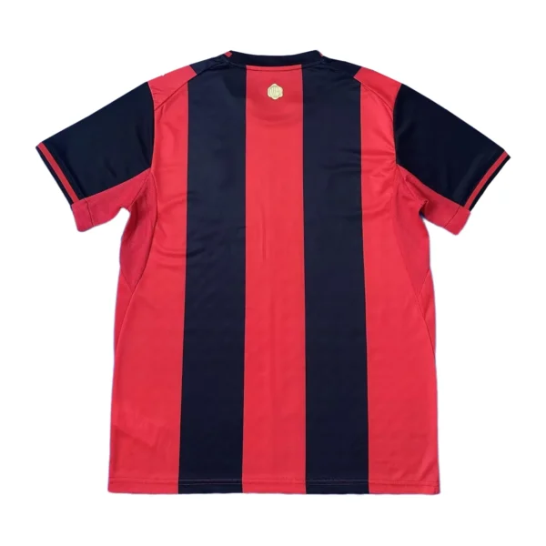 Red and navy striped football jersey for sports and team uniforms.