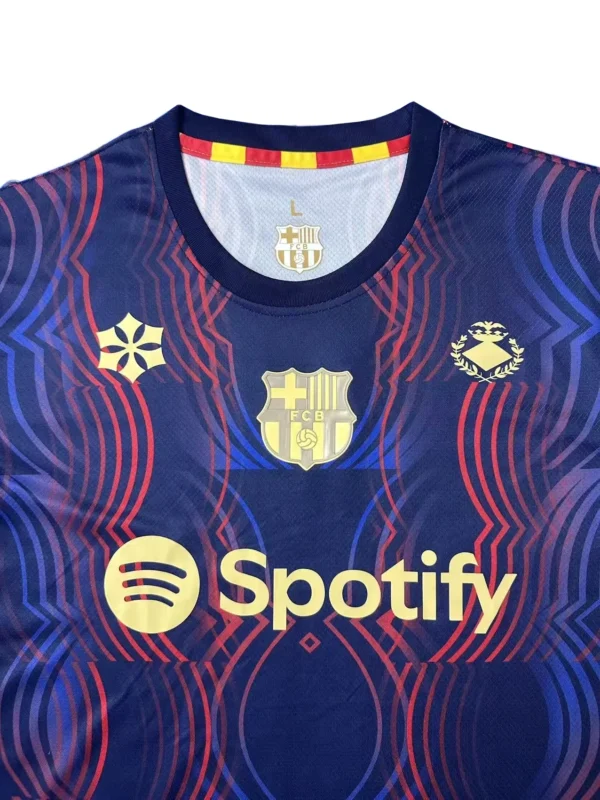Barcelona FC soccer jersey with Spotify logo and vibrant design.