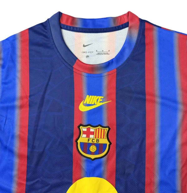 Barcelona FC soccer jersey with Nike logo and team crest. Barcelona FC Nike soccer jersey with team crest and vibrant blue-red stripes.