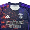 Sports jersey with Benfica logo and Adidas branding for football fans Football jersey featuring Benfica emblem, Adidas logo, and vibrant orange and purple design elements.
