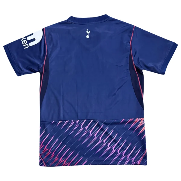 Sports Jersey with Tottenham Hotspur Logo for Soccer Fans Blue Tottenham Hotspur soccer jersey with stylish design and team logo for sports enthusiasts.